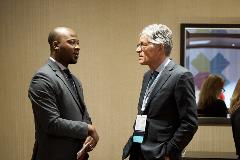 Olalekan Ajayi, PharmD, MBA, Welch Cancer Center, Sheridan Memorial Hospital, and Randall Oyer, MD, Lancaster General Hospital, exchange ideas between sessions.