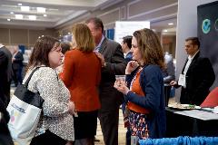 Attendees network with other oncology professionals in the Exhibit Hall.